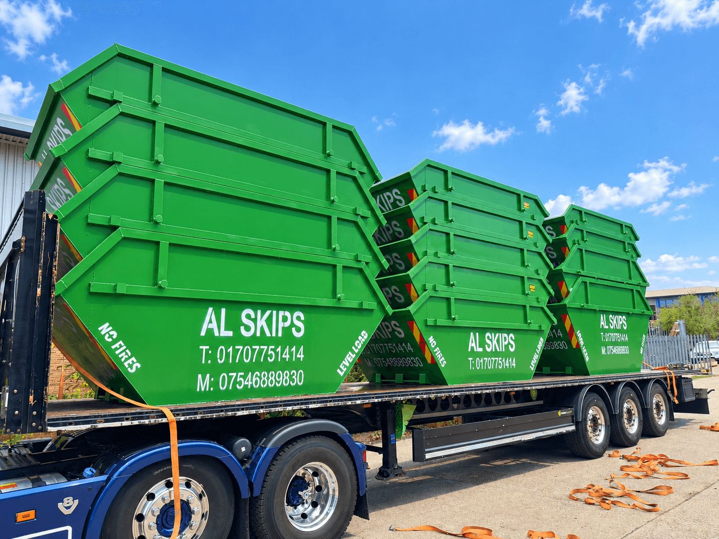 Green AL Skips skips loaded on a lorry trailer at the Welwyn Garden City yard
